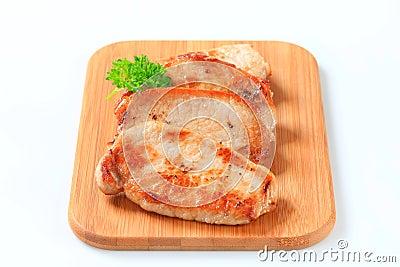 Pan seared pork cutlets Stock Photo