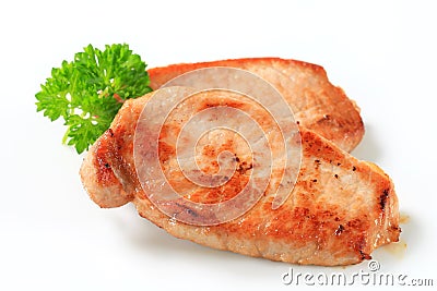 Pan seared pork cutlets Stock Photo