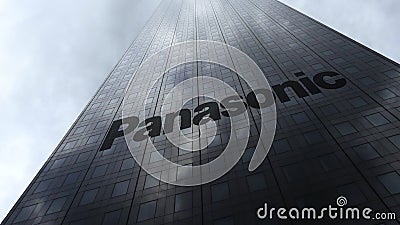 Panasonic Corporation logo on a skyscraper facade reflecting clouds. Editorial 3D rendering Editorial Stock Photo