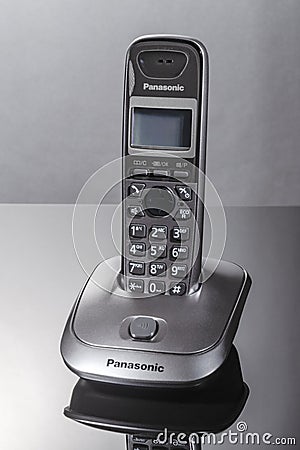 Panasonic dial telephone on gradient background. Editorial Stock Photo