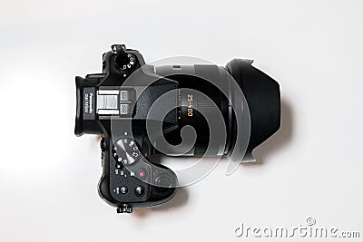 Panasonic Lumix FZ1000 Digital Camera on white desk. Top down view Editorial Stock Photo