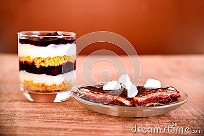 Pancake cake with fresh raspberry pistachios and dark chocolate Stock Photo