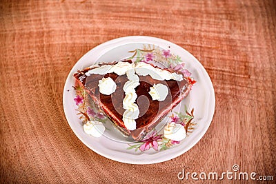 Pancake cake with fresh raspberry pistachios and dark chocolate Stock Photo