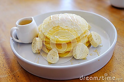 Pancake get served in the morning in the restaurant or the cafe. Food and drink set made by chef and served with hot drink. Stock Photo