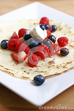 Pancake with summer fruits Stock Photo