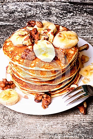 Pancakes with banana & walnut Stock Photo