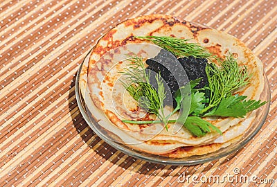 Pancakes with black caviar Stock Photo