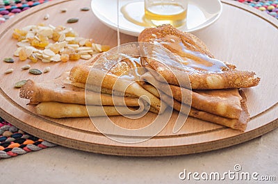 Pancakes, honey and nuts Stock Photo