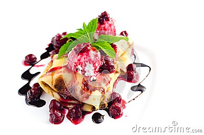 Pancakes with ice cream and cherry toping isolated on white Stock Photo