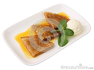 Pancakes in orange sauce with ice cream Stock Photo