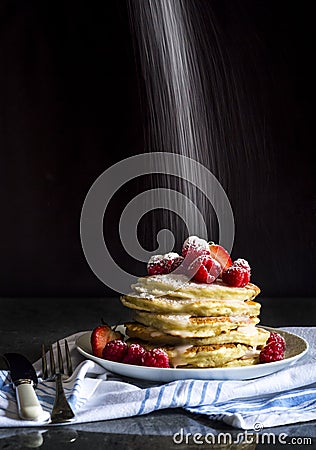 Pancakes & Raspberries on black Stock Photo