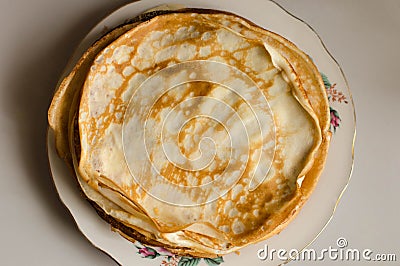 Pancakes or Russian Blintzes on white background. Selective focus Stock Photo