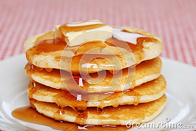 Pancakes with syrup and butter Stock Photo