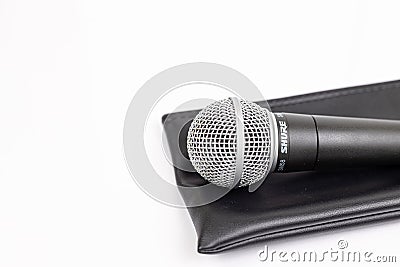 Pancevo, Serbia - 04/11/2020: Shure SM58 Microphone isolated above white background Editorial Stock Photo