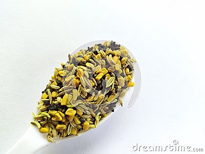 Panch phoron - A mixure of five spices on white background. Stock Photo
