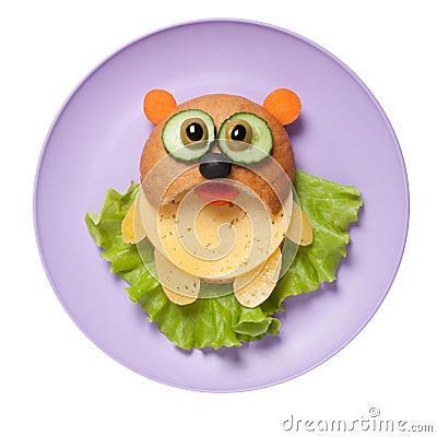 Panda created from bread, cheese and vegetables on plate Stock Photo