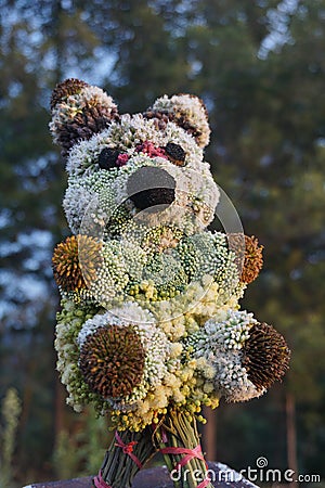 Panda doll toys made of flowers Stock Photo