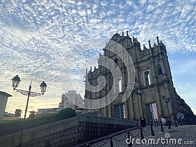 Colonial Portuguese Cathedral Architecture Macao Tourism at the base of Ruins of St. Paul Facade Macau China Dramatic Sky Clouds Editorial Stock Photo