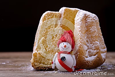 Pandoro cake with snowman Stock Photo