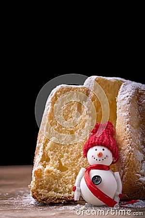 Pandoro cake with snowman Stock Photo