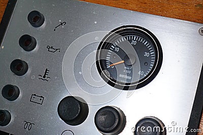 Panel with fuel gauge that is empty. An indication of the amount of diesel or petrol. Use fossil sparingly. Editorial Stock Photo