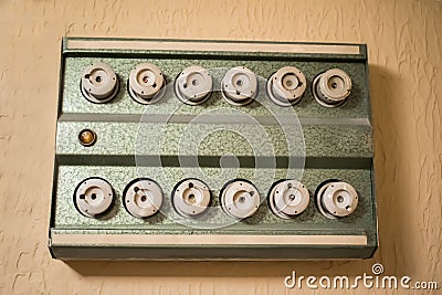 Panel with old electrical fuses Stock Photo