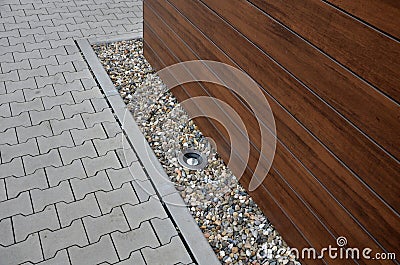 paneling of the building with boards replacement from plywood. pebble Stock Photo