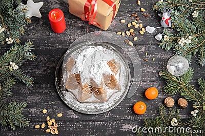 Panettone and christmas decoration on wooden table Stock Photo