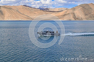 PANGONG LAKE, LEH, INDIA-JULY 6th 2016: Border security force patrol boat comes back after survey of line of actual control or Editorial Stock Photo