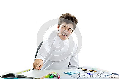 Panicky Caucasian smooth-skinned boy pointing to homework Stock Photo