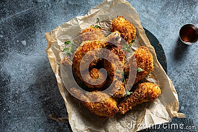 Panko breaded fried chicken drumsticks Stock Photo