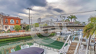 Pano Beautiful canal with walkways and footbridge in scenic Long Beach California Editorial Stock Photo