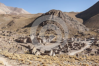 Panorama of abandoned and decaying houses in San Antonio de Lipez ghost village at the footstep of San Antonio volcano Stock Photo
