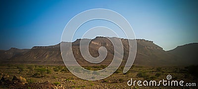 Panorama with Adrar mountain near Terjit, rocks and gorge, Mauritania Stock Photo