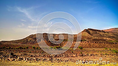 Panorama with Adrar mountain near Terjit, rocks and gorge, Mauritania Stock Photo