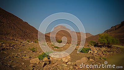 Panorama with Adrar mountain near Terjit , rocks and gorge, Mauritania Stock Photo