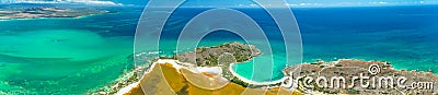 Panorama aerial view of Puerto Rico. Faro Los Morrillos de Cabo Rojo. Playa Sucia beach and Salt lakes in Punta Jaguey. Stock Photo