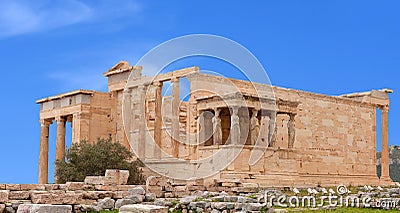 Panorama of ancient Erechtheion Greek temple with Porch of the Caryatids at the Acropolis in Athens, Greece Stock Photo