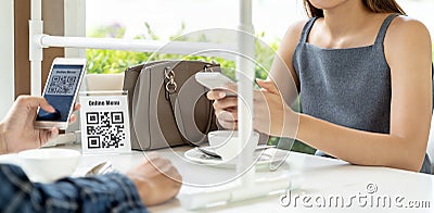 Panorama Asian customer scanning QR code for online menu un new normal restaurant Stock Photo