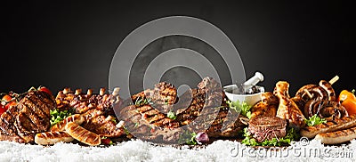 Panorama banner of grilled meat from a winter BBQ Stock Photo