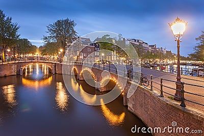 Panorama of beautifull Amsterdam canals with bridge, Holland Stock Photo