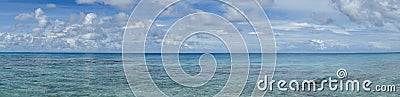 Panorama of blue sky and turquoise water in the Pacific Ocean off Bora Bora in French Polynesia Stock Photo