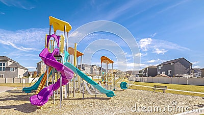 Panorama Brightly colored apparatus on a kids playground Stock Photo
