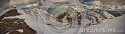 Panorama with the Bucegi Mountains plateau where you can see Omu Peak, Morarului Valley, Morarului Ridge and Costila Refuge and Te Stock Photo