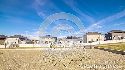 Panorama Climbing dome in a kids playground in a city Stock Photo