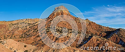Panorama of a colorful desert landscape and high peak at Ghost Ranch Stock Photo