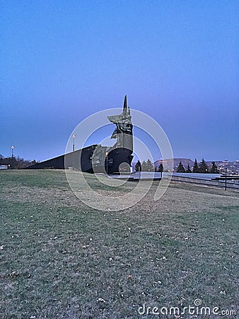 Panorama of the Donbass. Monument to the liberators of Donbass. Park of the Leninist Komsomol. Heaps on the horizon. Editorial Stock Photo