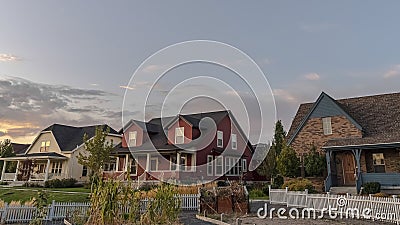 Panorama frame Three homes on a modern housing estate Stock Photo