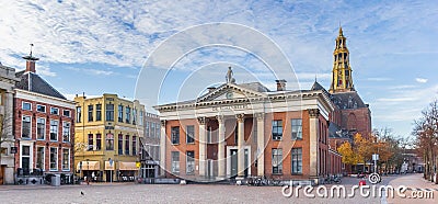 Panorama of the grain exchange building and church tower at the fish market square in Groningen Editorial Stock Photo