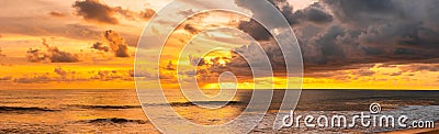 Panorama of how to set the sun, Beautiful glorious golden sunset above the sea in evening Stock Photo